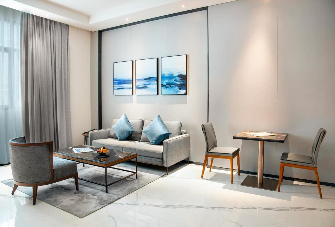 דובאי Asiana Grand Hotel מראה חיצוני תמונה A living room at the hotel