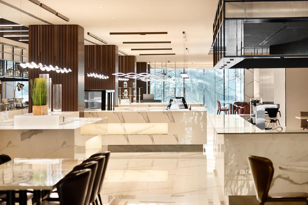דובאי Asiana Grand Hotel מראה חיצוני תמונה The lounge at the airport