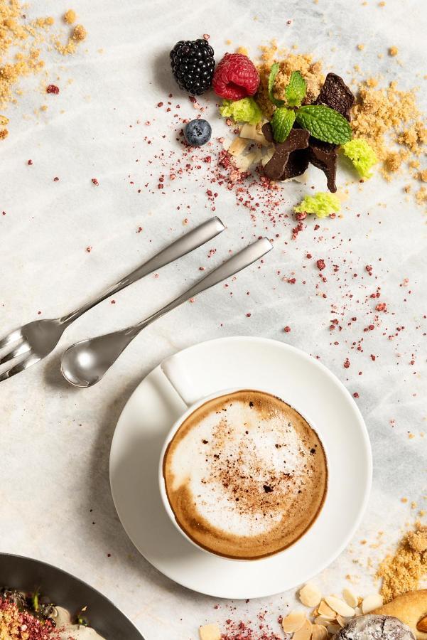 דובאי Asiana Grand Hotel מראה חיצוני תמונה A cup of coffee