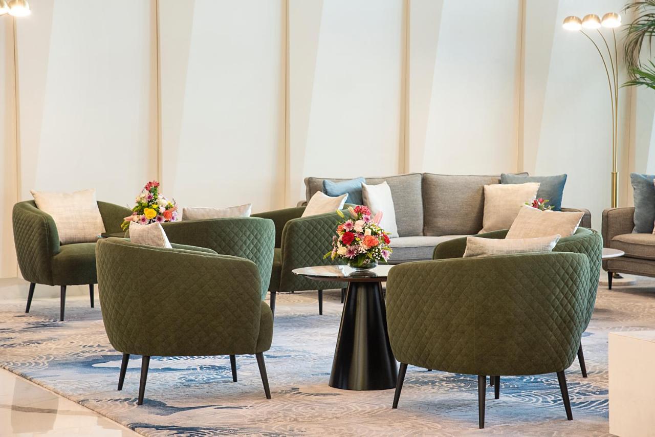 דובאי Asiana Grand Hotel מראה חיצוני תמונה The lounge at the airport